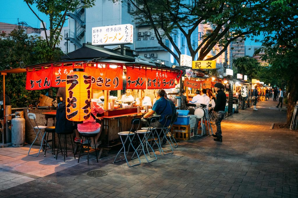 People Eating in Street Food Restaurants in Japan