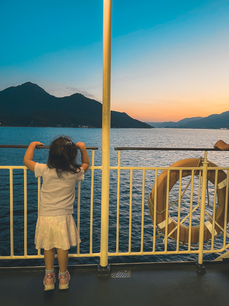 Looking out to sunset from ferry Miyajima to Hiroshima