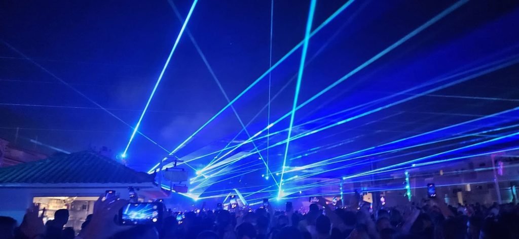 Raving with blue spot lights in Ibiza