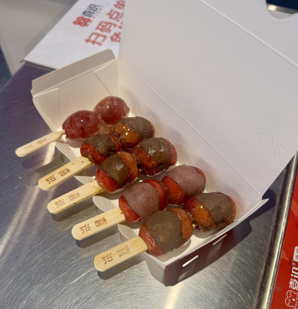 Tanghulu, Strawberries with Red Bean paste on a stick, Beijing with Kids this is a must-try snack