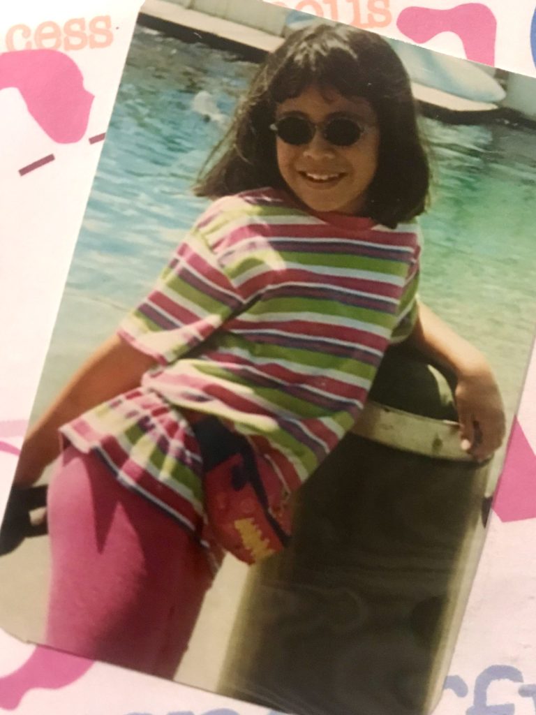 Child in sunglasses by water, Living Abroad in China